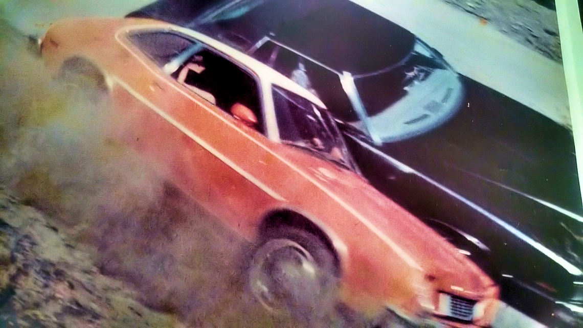 Hal Needham holds Jean Coulter's vehicle from impending doom!